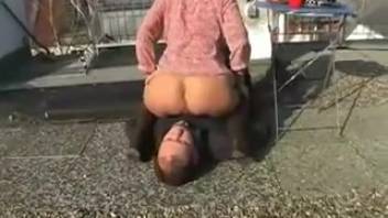 Lady defecates in guy's mouth on the road
