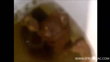 Woman with incredible huge butt defecating in the bathroom